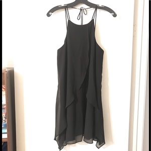 Black trapeze dress with tie